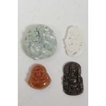 Four Chinese carved hardstone pendants in the form of auspicious animals and deities, largest 2"