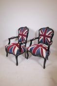 A pair of black gloss painted open armchairs with Union Flag upholstery