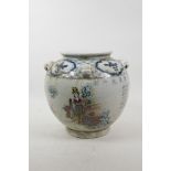 A Chinese blue and white pottery jar with four mask lugs, with polychrome decoration depicting