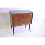 A mid century walnut record cabinet, complete with albums, classical, opera, dance etc, 24" x 15"