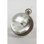 A brass bound ball desk clock, 2½" diameter