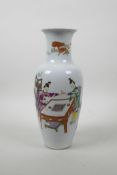 A Chinese polychrome porcelain vase decorated with women playing Go, 6 character mark to base,