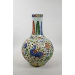 A Chinese doucai porcelain reticulated bottle vase decorated with birds and lotus flowers, 6