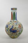 A Chinese doucai porcelain reticulated bottle vase decorated with birds and lotus flowers, 6