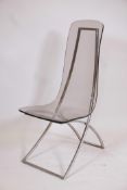 A chrome and perspex Eames style chair, c1970, 36" high