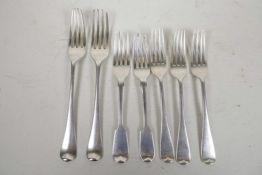 A variety of seven late Regency and early Victorian sterling silver forks, all hallmarked, some with