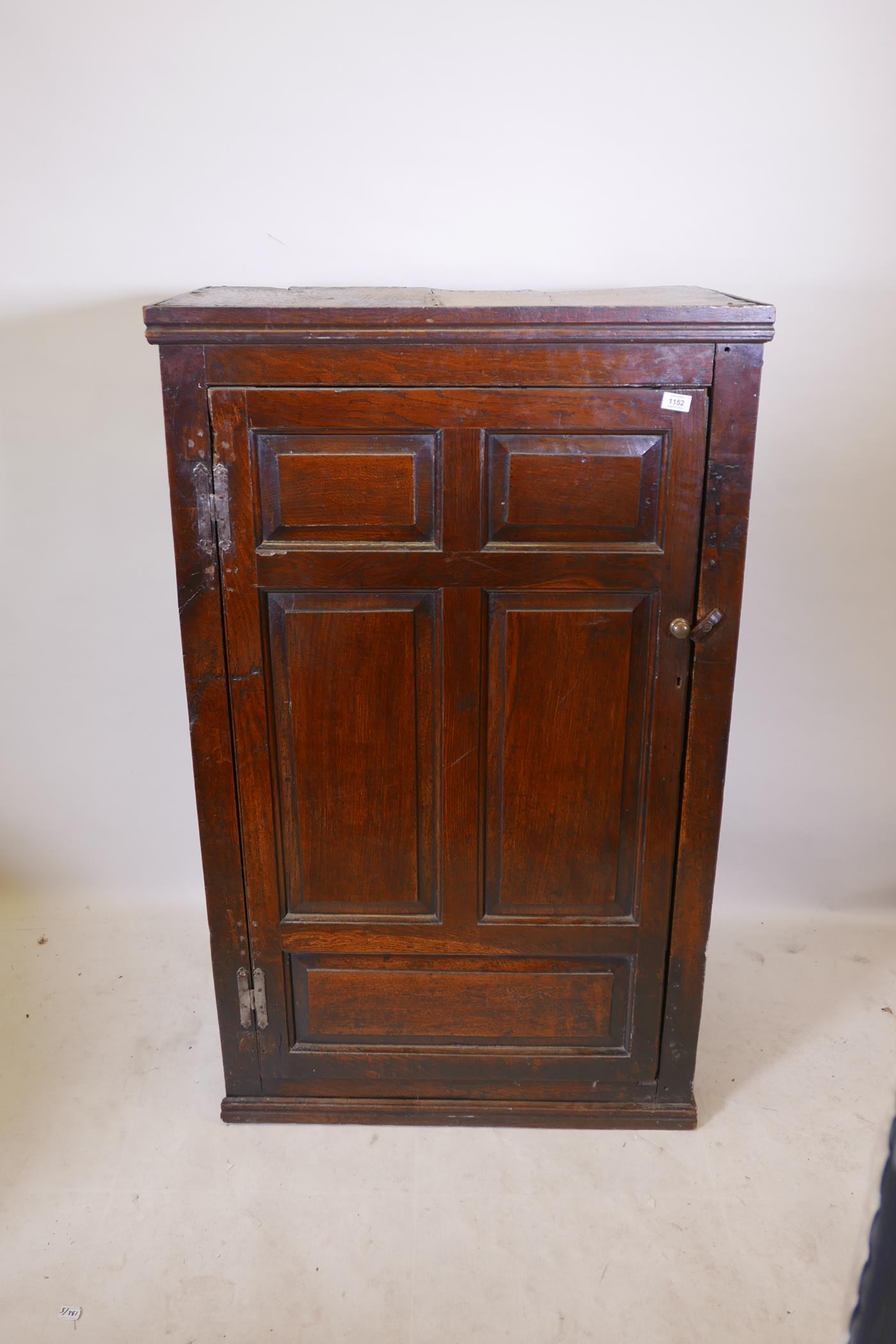 An C18th oak cupboard, with fielded panel door, 33" x 19" x 55" - Image 2 of 3