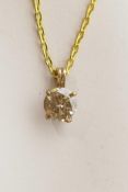A 14ct yellow gold champagne diamond pendant necklace, on a gilt chain, 2.2cts