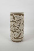 A Chinese Cizhou pottery sleeve vase with chased lotus flower decoration, 10" high x 5" diameter