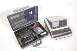 A Sony CCD-V7AF-E video camera recorder in case, and a vintage National (Panasonic) transistor TV,