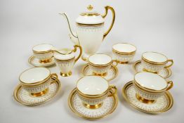 An elegant 1930s Copelands Grosvenor China coffee set, with rich gilded decoration in the Grecian