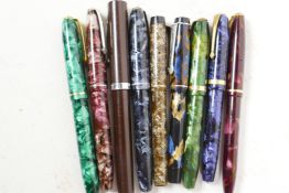 A collection of fountain pens, six Conway Stewart, one Sheaffer, one Valentine, and one Koppy Kleen,