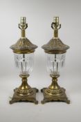 A pair of French brass table lamps with a moulded glass centre section, 20½" high