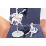 A Swarovski Crystal figurine of a ballerina on point, number A7550-NR000-004, 6" high, together with