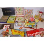 A quantity of children's board games from the early C20th, Jiggle Joggle, Pegity, Rail Race,