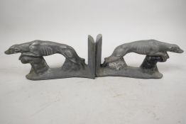 A pair of metal greyhound bookends