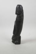 A Chinese carved hardstone phallic ornament, 10" long
