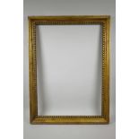 A giltwood picture frame with carved dentil decoration, rebate 25" x 18"