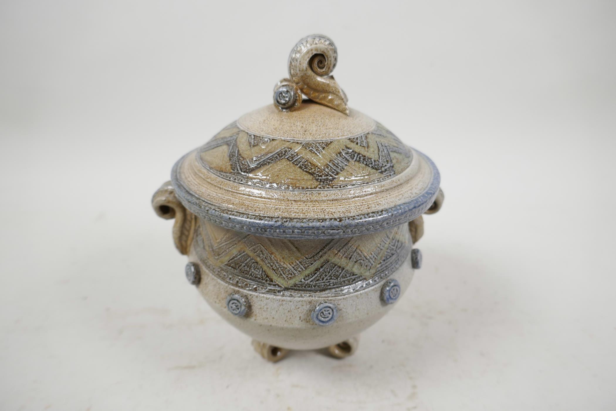 Carol King (British), studio pottery sweet jar and cover, raised on three feet, 7½" high, 6"