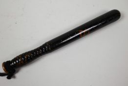 A small Victorian turned hardwood truncheon painted with initials, 12" long