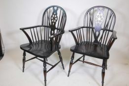 A pair of painted beech Windsor wheel back armchairs
