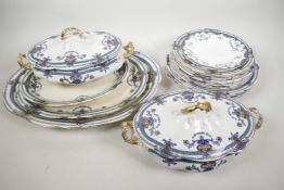 A C19th Staffordshire part dinner service including three oval platters, two oval tureens and covers