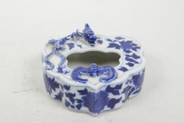 A Chinese blue and white porcelain ink pot with applied bat and dragon decoration, 4½" x 4"