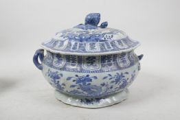 A Chinese blue and white porcelain two handled tureen and cover with floral decoration, 10½" x 9",