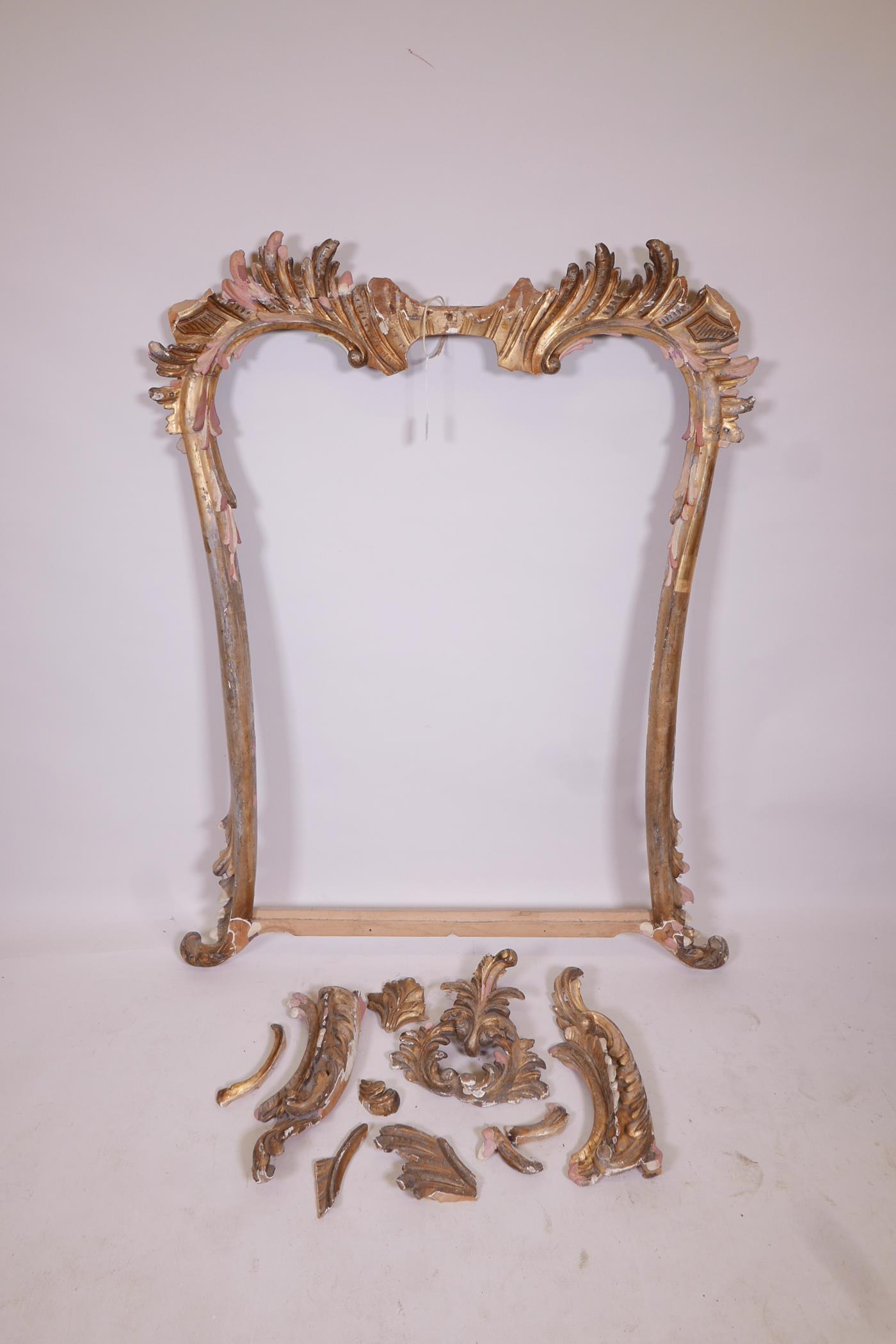 A Continental carved overmantel mirror frame, A/F, rebate 29" x 40"