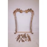 A Continental carved overmantel mirror frame, A/F, rebate 29" x 40"