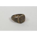 A bronze Viking style ring with engraved inscription