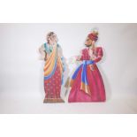 A pair of Indian painted wood figural wall plaques, 47" high
