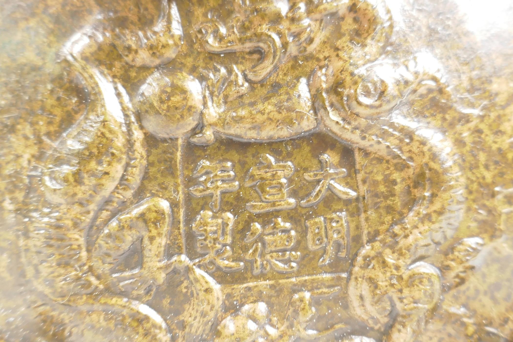 A Chinese gilt splash bronze censer and cover on tripod feet, with pierced waterfowl and lotus - Image 3 of 3