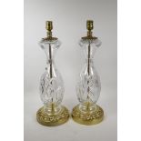 A pair of French glass and brass table lamps, 29" high