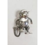 A 925 silver and marcasite brooch in the form of a monkey, 1½"