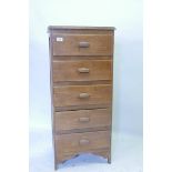 A grain painted pine five drawer chest, early C20th, 19" x 17" x 42"