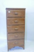 A grain painted pine five drawer chest, early C20th, 19" x 17" x 42"