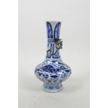 A Chinese blue and white porcelain vase with applied climbing kylin and carp decoration, 7" high