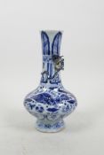 A Chinese blue and white porcelain vase with applied climbing kylin and carp decoration, 7" high