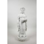 A Chinese blanc de chine figure of Buddha holding a peach, impressed marks verso, 17" high