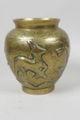 A Chinese bronze vase having chased decoration of deer and birds amongst trees, character marks to