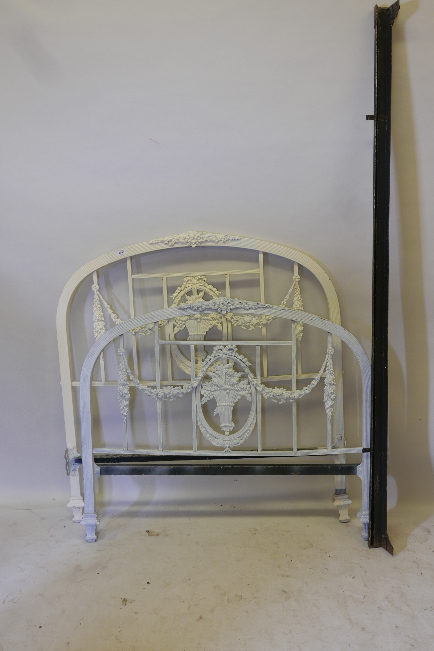 An early C20th French painted brass bed with swag and floral decoration, 42" wide x 44" x 74"