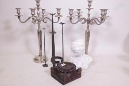 A collection of pricket candlesticks, tallest 20" high, and a pair of four branch candelabra