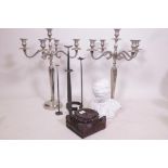 A collection of pricket candlesticks, tallest 20" high, and a pair of four branch candelabra