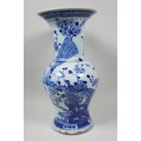 A C19th Chinese blue and white porcelain vase decorated with peacocks and prunus blossom, 14"