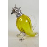 A vaseline glass decanter in the form of a cockatoo with silver plated head and legs, 6¼" high