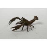 A Japanese Jizai style bronzed metal crayfish, impressed mark to base, 4" long