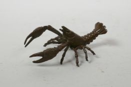 A Japanese Jizai style bronzed metal crayfish, impressed mark to base, 4" long