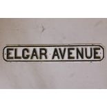 A painted cast iron road sign, 'Elgar Avenue', 39" x 7"