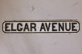 A painted cast iron road sign, 'Elgar Avenue', 39" x 7"